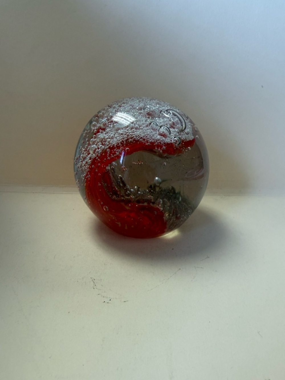 Hand-Made Red Orange and Beige Ocean Wave Swirl Glass Paperweight.